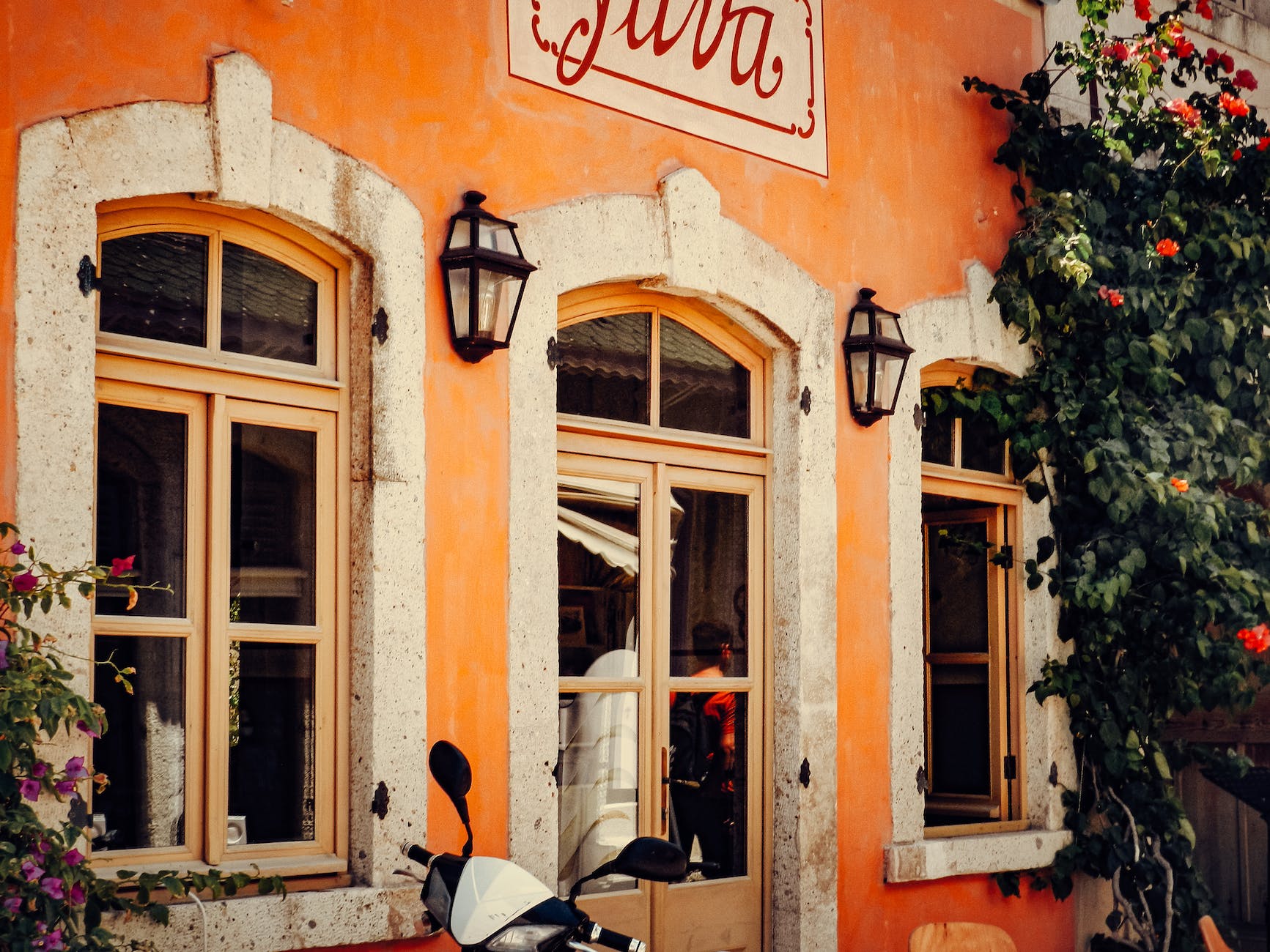 lanterns by the entrance to a cafe