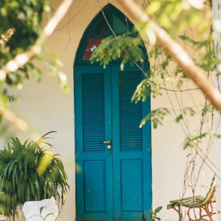 closed blue wooden doors