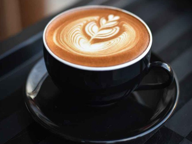 close up of coffee cup on table